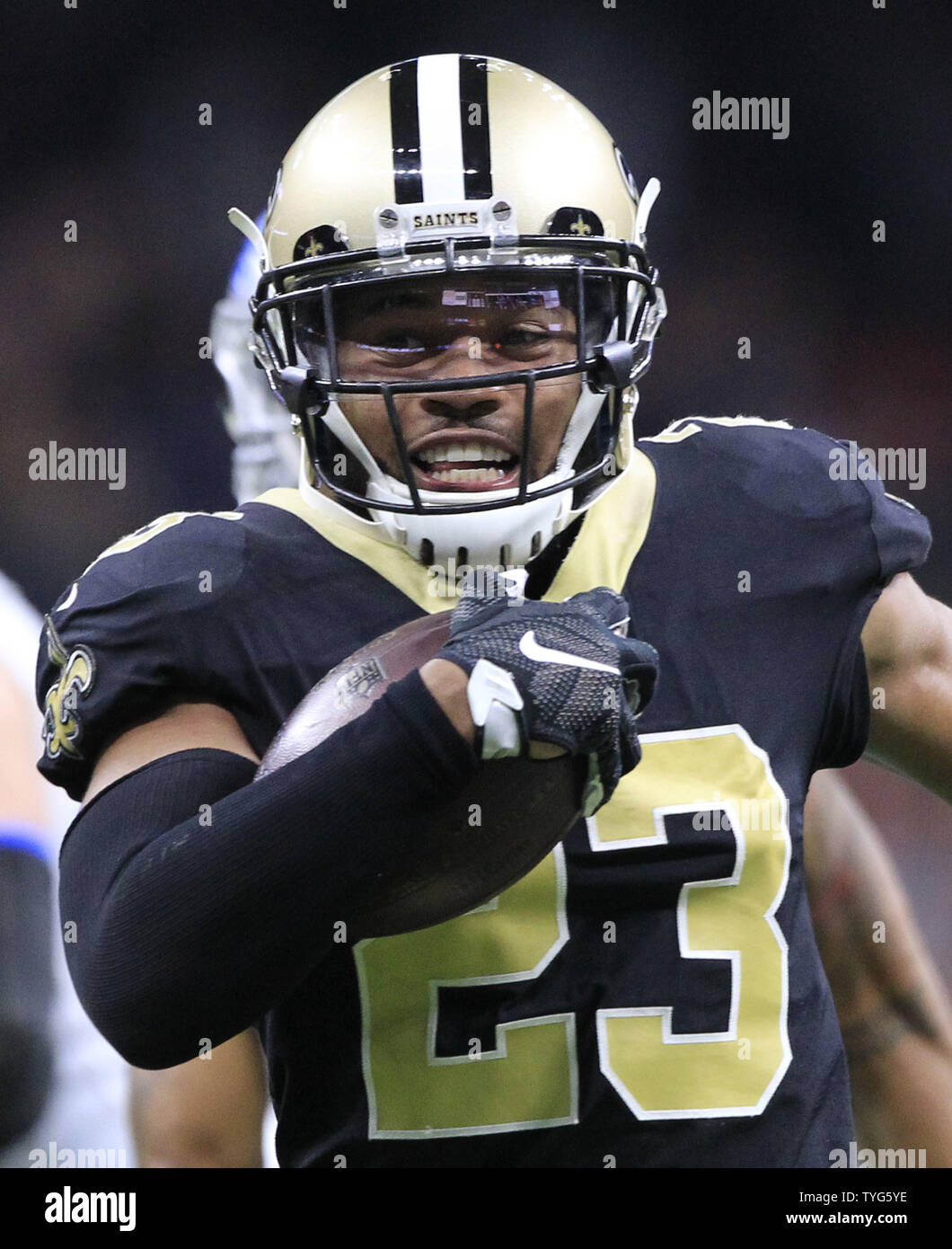 New Orleans Saints cornerback Marshon Lattimore (23) runs back an  interception of Detroit Lions quarterback Matthew Stafford pass for a  27-yards touchdown in the third quarter at the Mercedes-Benz Superdome in  New