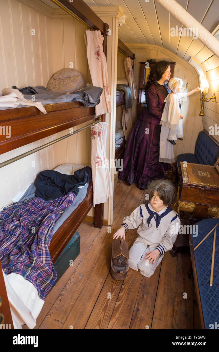 Cabin room / cabin rooms / bedroom / bed room  with bunk beds & model figures to illustrate first class passenger life on board the SS Great Britain. Promenade saloon deck. Brunel's ship is now a museum attraction in drydock at Bristol, UK England (109) Stock Photo