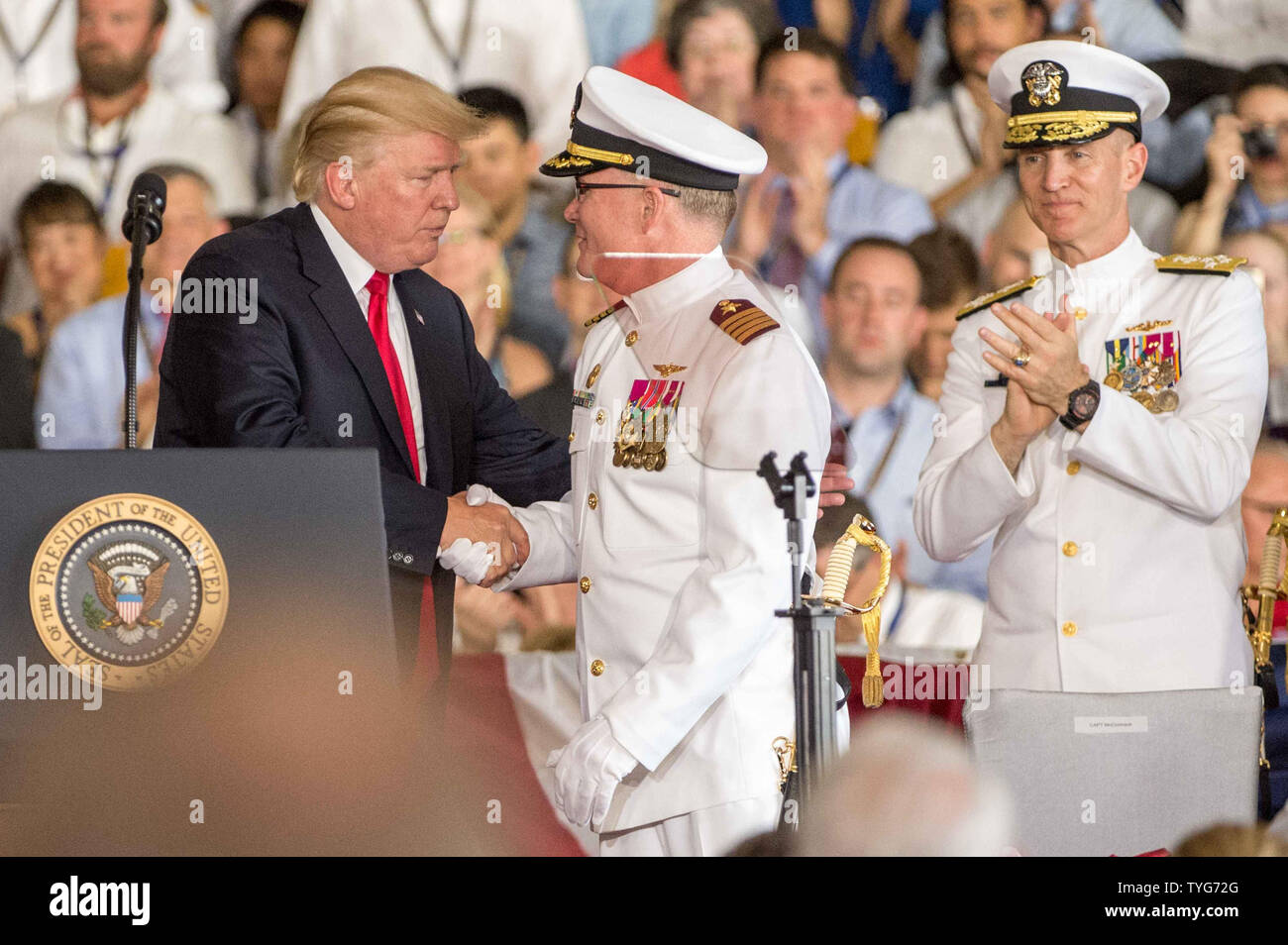 President Donald Trump shakes hands with Capt Richard McCormack, USN ...