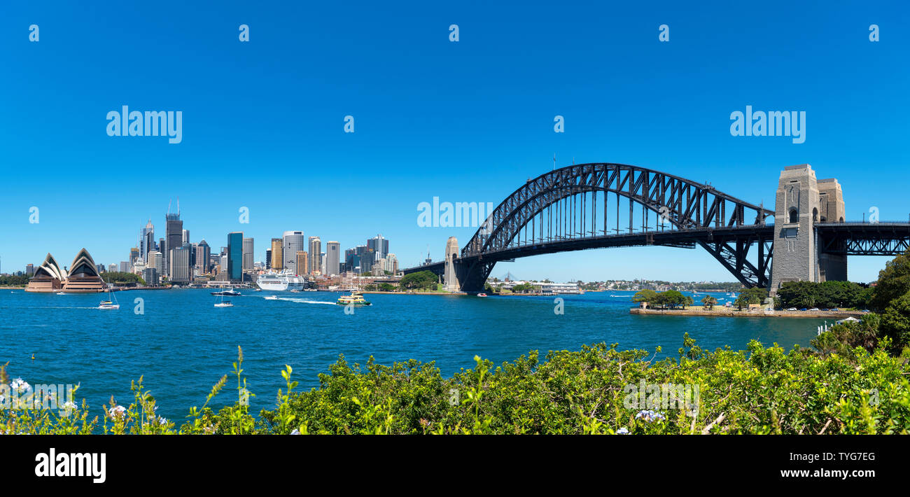 Panoramic view of Sydney Harbour Bridge, Sydney Opera House and the Central Business District skyline from Kirribilli, Sydney, Australia Stock Photo