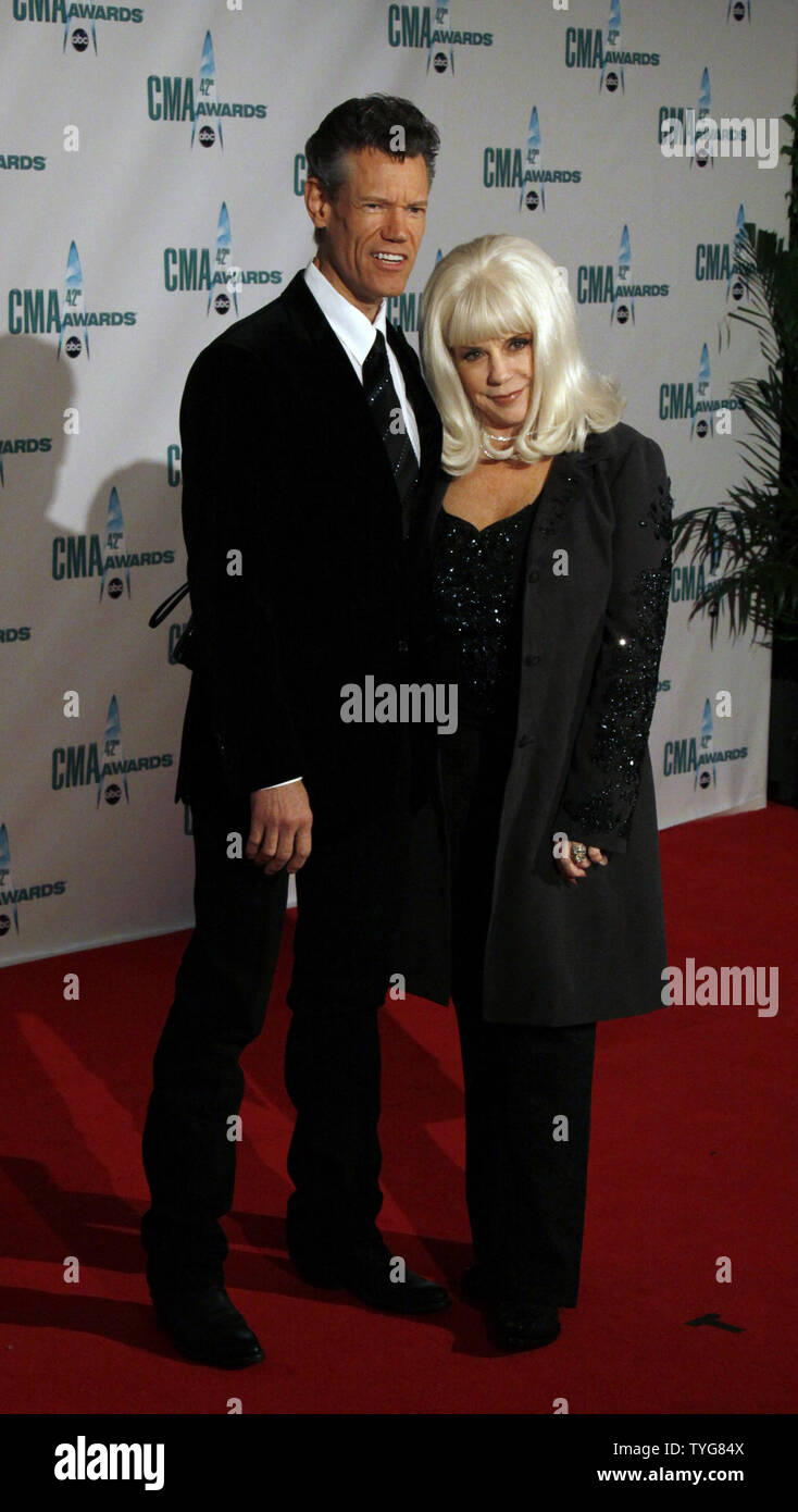 Travis Tritt (L) and wife Theresa arrive on the red carpet at the 42nd annual Country Music Association (CMA) awards in Nashville, Tennessee on November 12, 2008. (UPI Photo/Frederick Breedon IV) Stock Photo