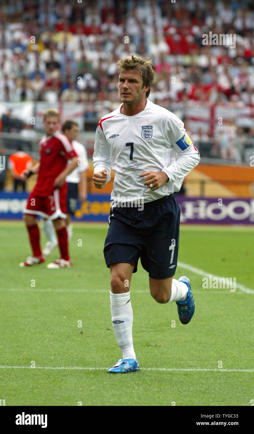David Beckham (7) runs in World Cup soccer action in