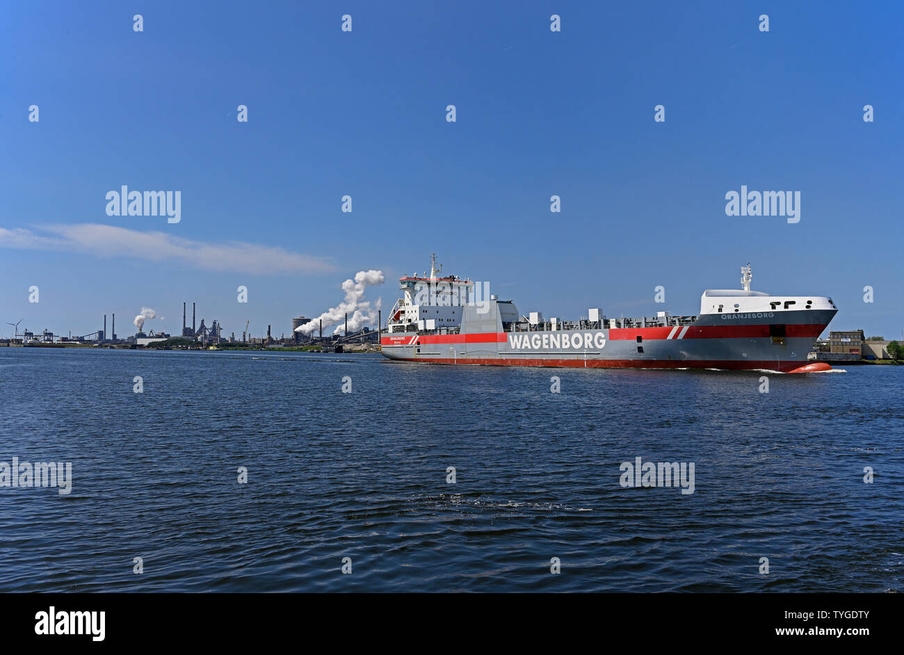 ijmuiden, netherlands - 2019.06.17:  ro-ro cargo vessel oranjeborg (imo# 9232797) on north sea canal inbound for amsterdam / background: tata steel wo Stock Photo