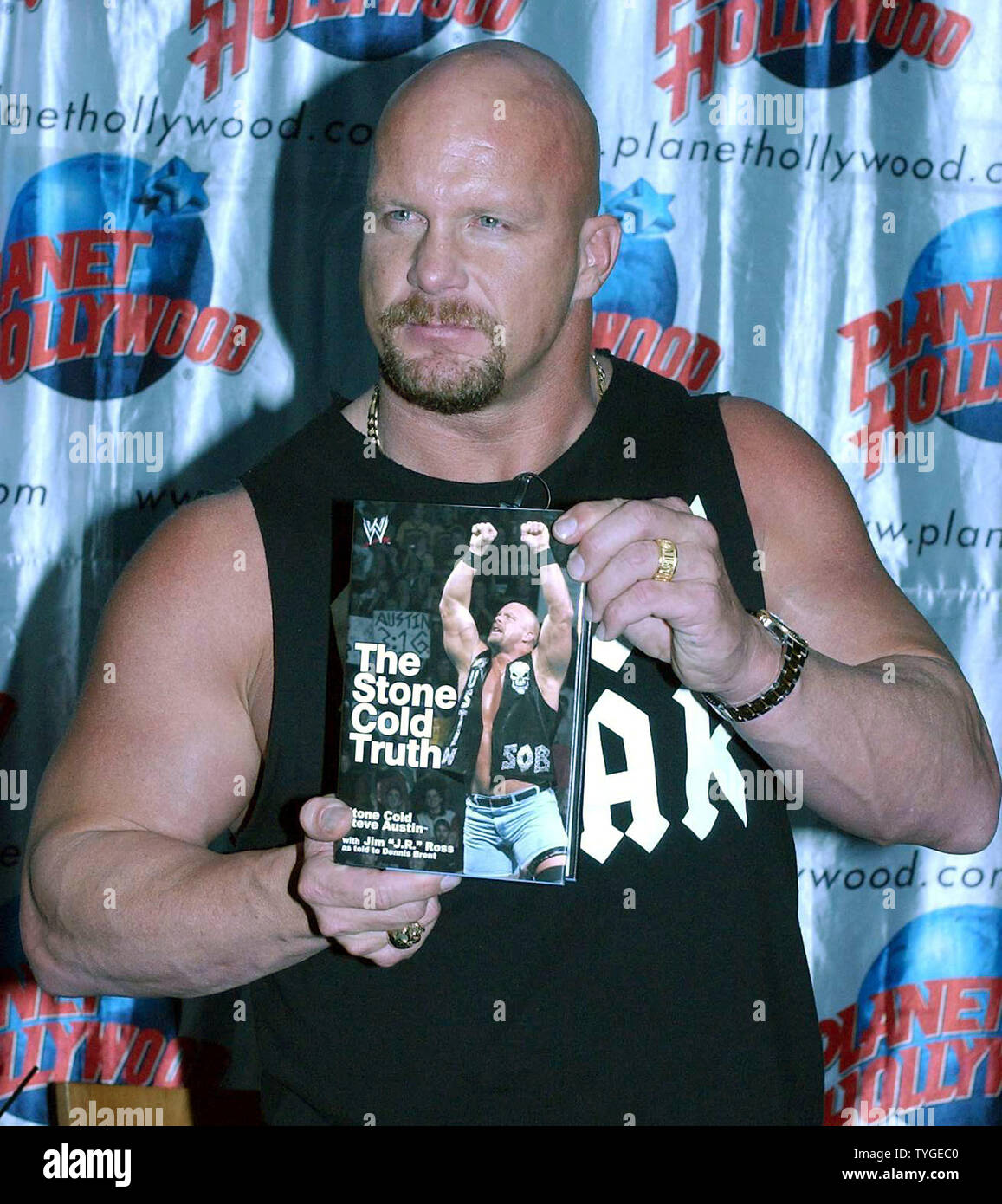 World Wrestling Federation star Stone Cold Steve Austin poses for the media on October 30, 2003 at New York's Planet Hollywood for the launch of his autobiography 'The Stone Cold Truth.'  (UPI/Ezio Petersen) Stock Photo