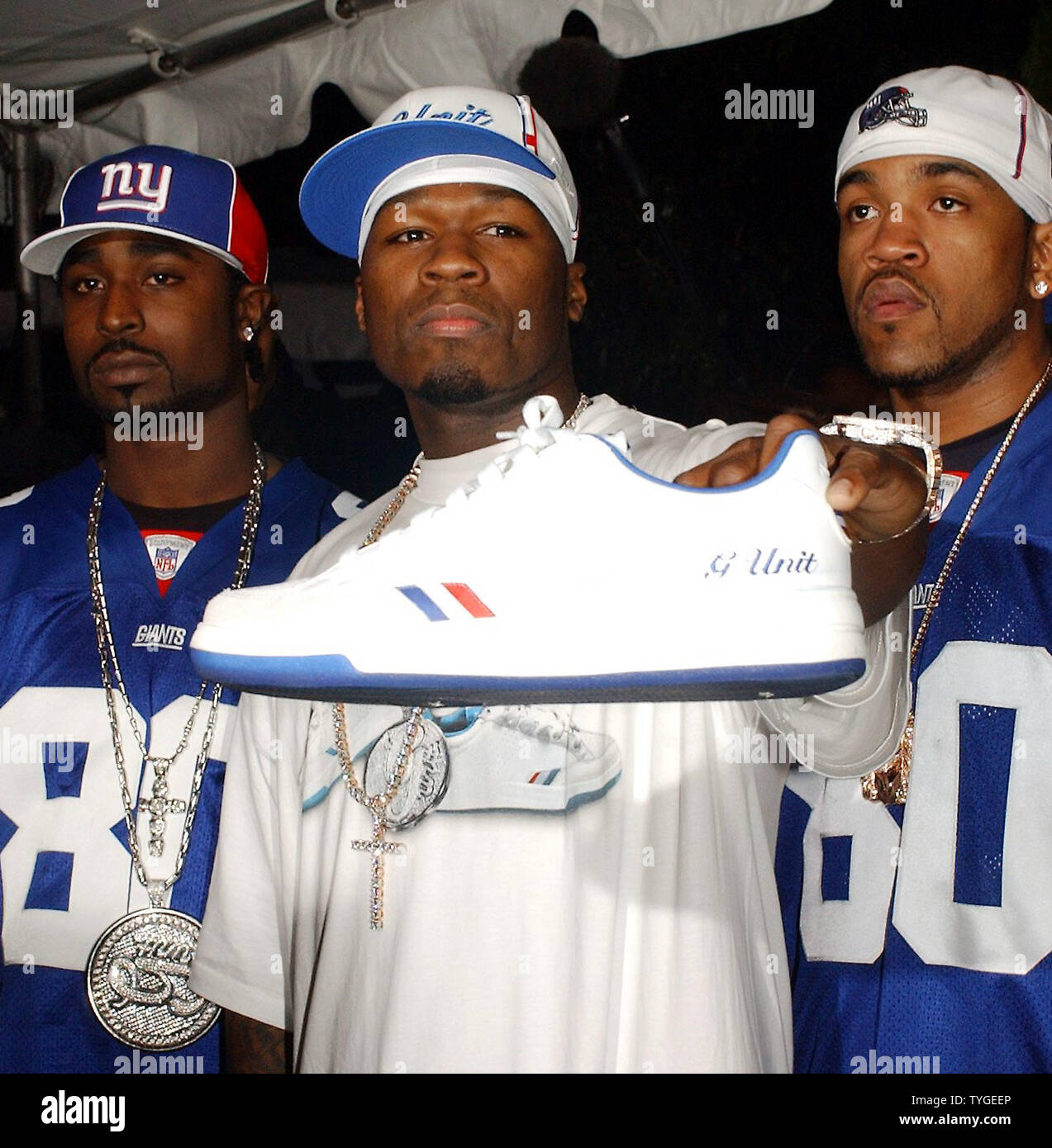 Reebok spokesperson rapper 50 Cent and his possee meet the media at a New  York nightclub on Nov. 4, 2003 to launch his G6 lifestyle footware.  (UPI/Ezio Petersen Stock Photo - Alamy