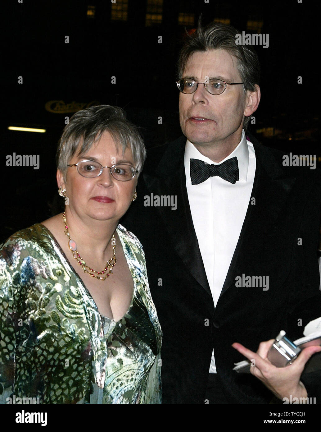 Stephen King and wife Tabitha pose for pictures at the 2003 National Book  Awards Ceremony Honoring