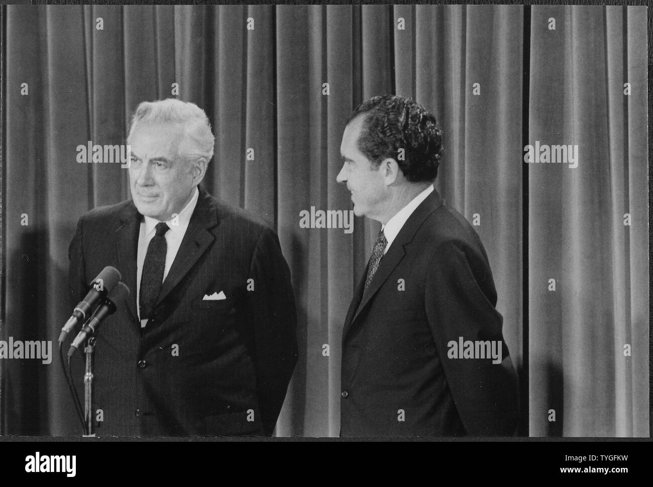 President Nixon looks on as the newly appointed chief justice of the President Nixon looks on as the newly appointed chief justice of the