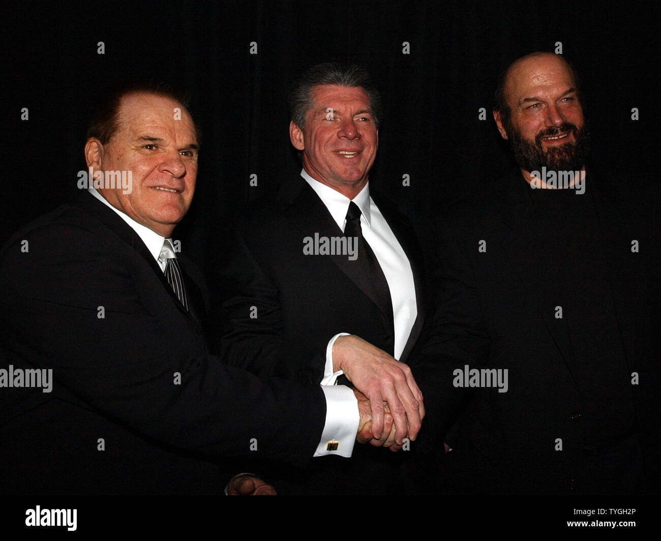 Pete Rose, special inductee, Vincent McMahon, head of the WWE and inductee  former Governor of Minnesota Jesse The Body Ventura (left to right) pose  for the media at the March 13, 2004