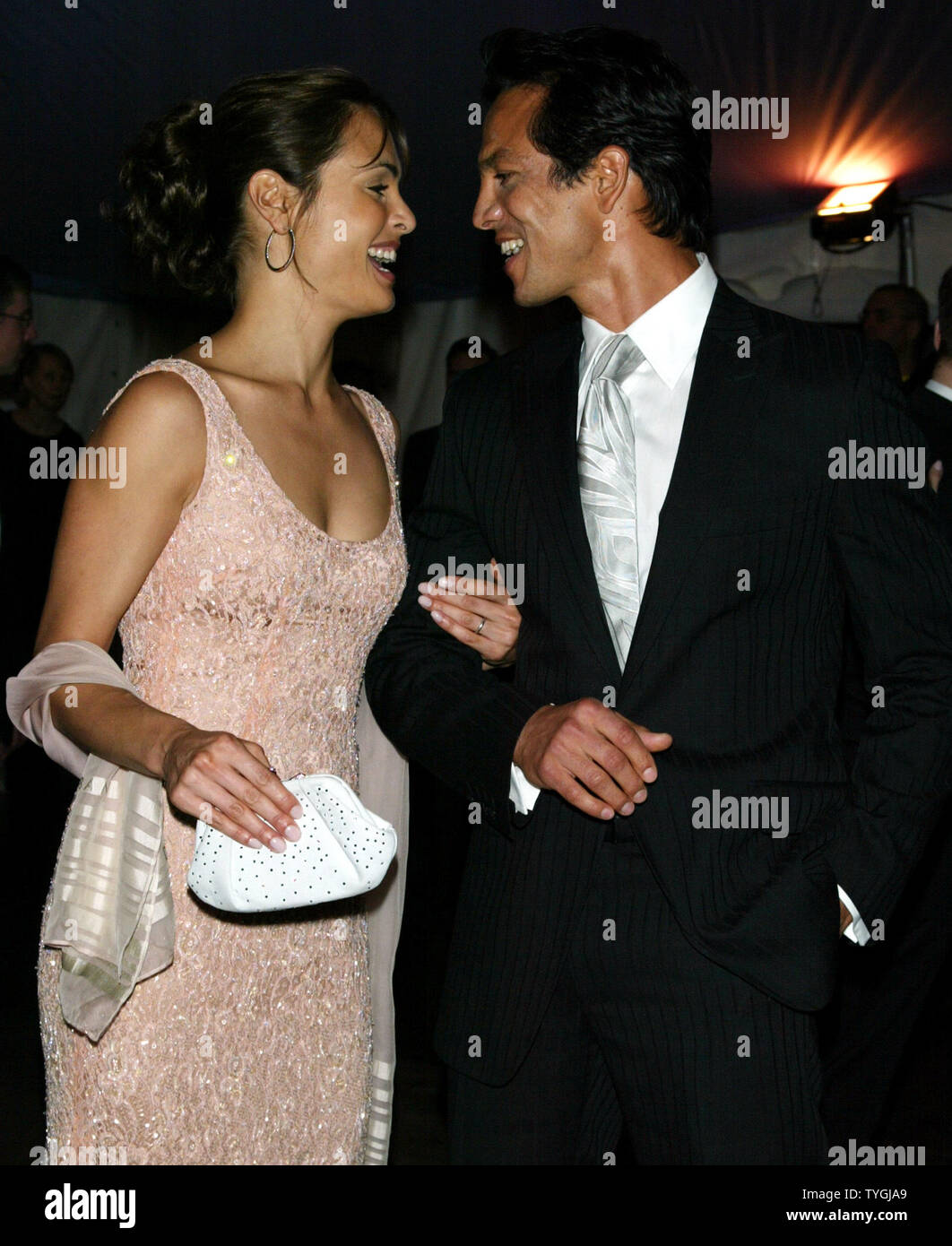 Benjamin Bratt and wife Talisa Soto pose for pictures at the Costume Institute Gala Celebrating 'Dangerous Liaisons: Fashion and Furniture in the 18th Century' at the Metropolitan Museum of Art in New York on April 26, 2004.   (UPI Photo/Laura Cavanaugh) Stock Photo