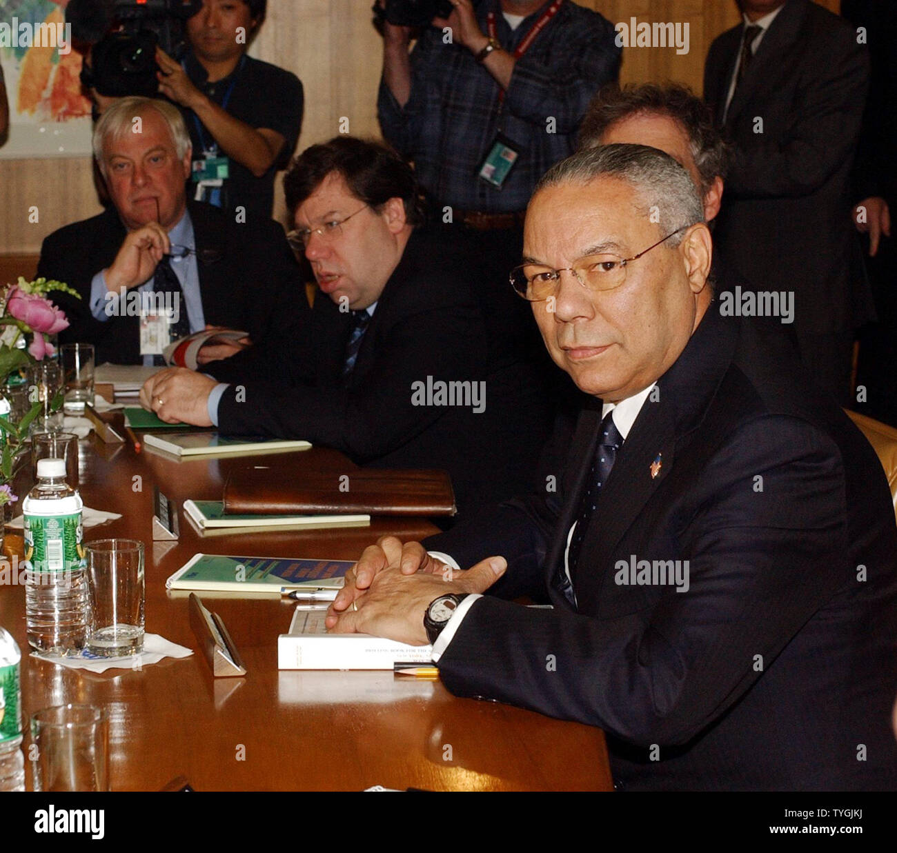 U.S. Secretary of State Colin Powell (foreground) and Brian Cowan, Foreign Minister of Ireland (head of table) take part in the  Middle East Quartet meetings on May 4, 2004  at the United Nations. (UPI/Ezio Petersen) Stock Photo