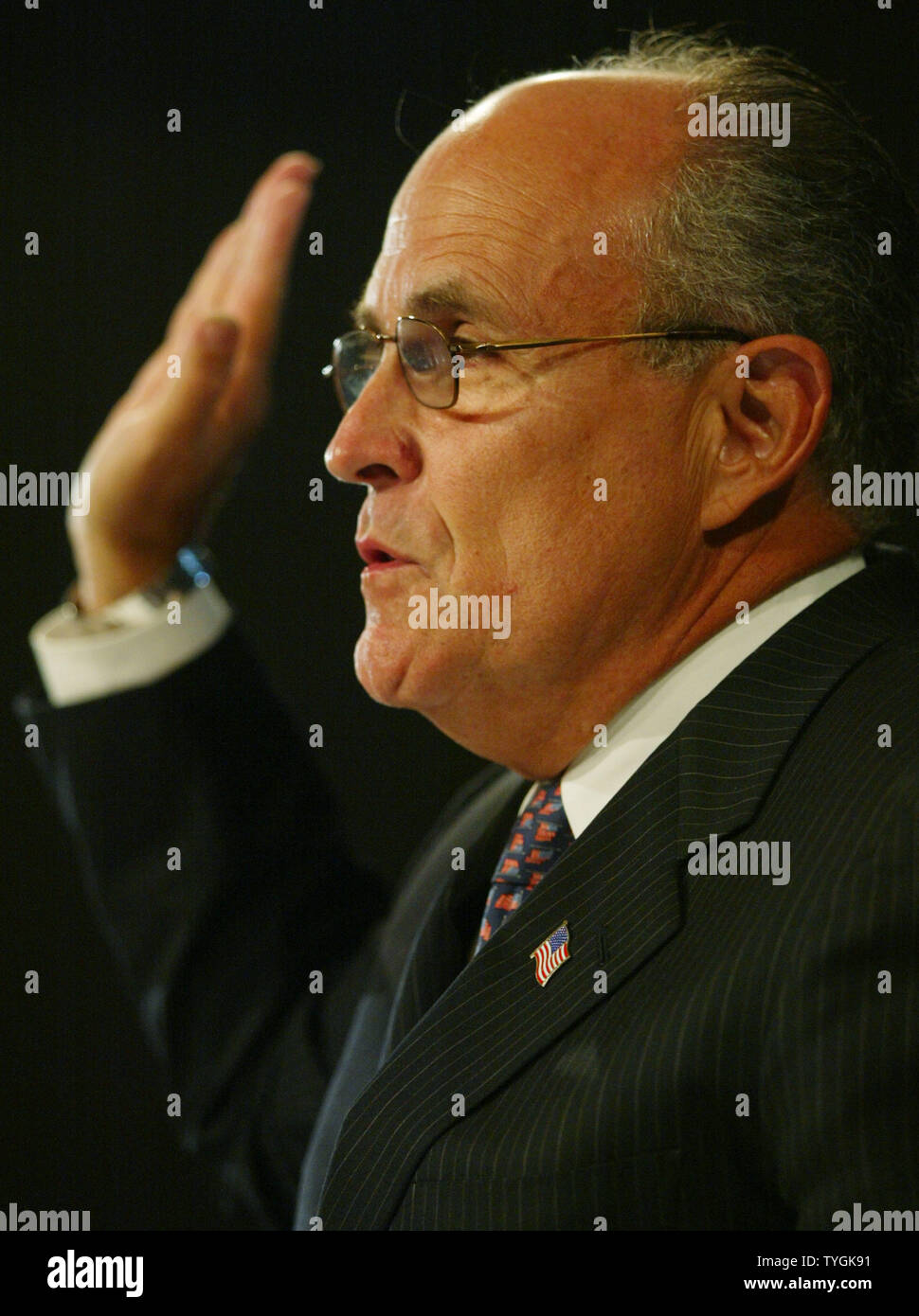 Former New York City mayor Rudolph Giuliani testifies before the National Committee on Terrorist Attacks Upon the U.S.A. about emergency response during the September 11th terrorist attacks during a hearing held at the New School University in New York May 19, 2004.    (UPI Photo/Monika Graff) Stock Photo