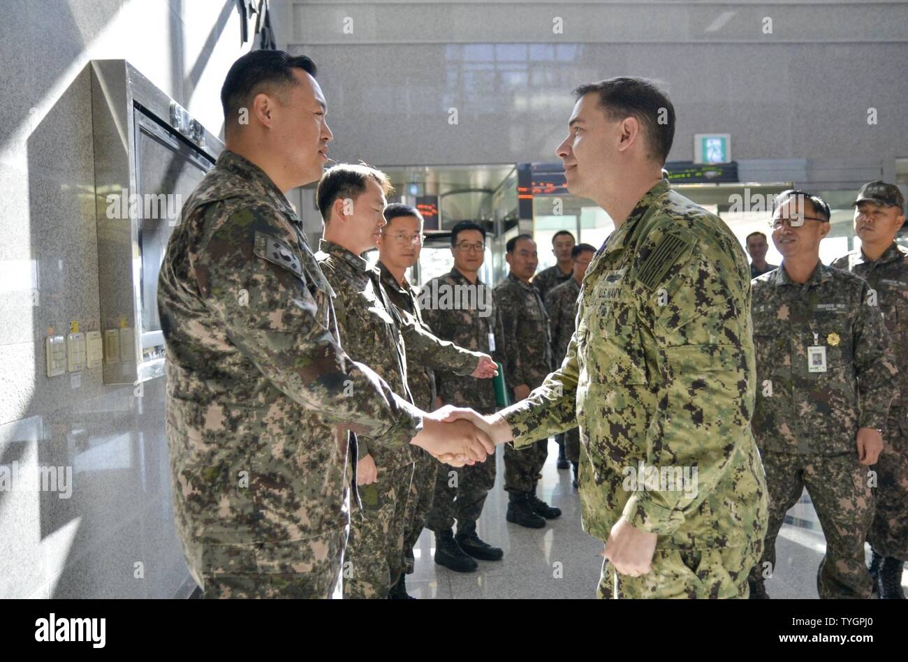 MOKPO, Republic of Korea (Nov. 8, 2016) Rear Adm. Brad Cooper, the commander of U.S. Naval Forces Korea (CNFK) introduces himself to Republic of Korea (ROK) 3rd Fleet department heads during a visit to ROK 3rd Fleet headquarters. CNFK is the U.S. Navy's representative in the ROK, providing leadership and expertise in naval matters to improve institutional and operational effectiveness between the two navies and to strengthen collective security efforts in Korea and the region. Stock Photo