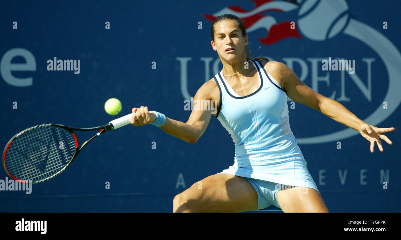 Amelie Mauresmo hits a forehand during her 3 set victory over Julia  Vakulenko at the US Open in Flushing, New York on September 1, 2004. (UPI  Photo/John Angelillo Stock Photo - Alamy