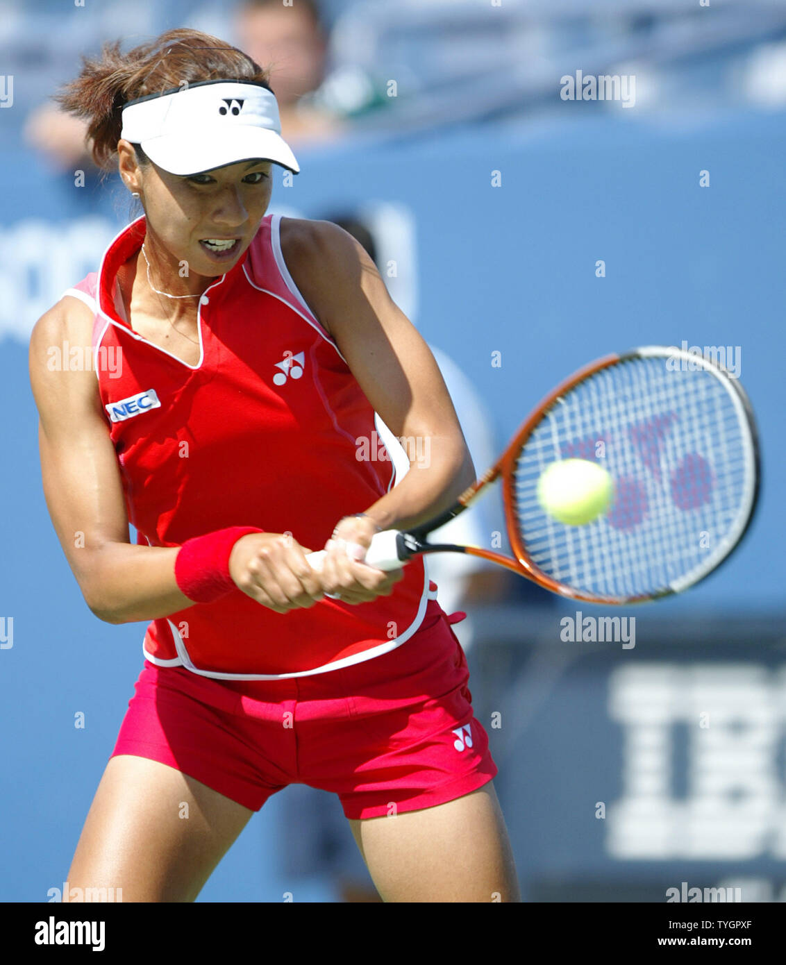 Shinobu Asagoe (JPN) hits a backhand during her defeat of Eleni Daniilidou (GRE) in 3 sets during day 8 action at the US Open in Flushing, New York on September 6, 2004.    (UPI Photo/John Angelillo) Stock Photo