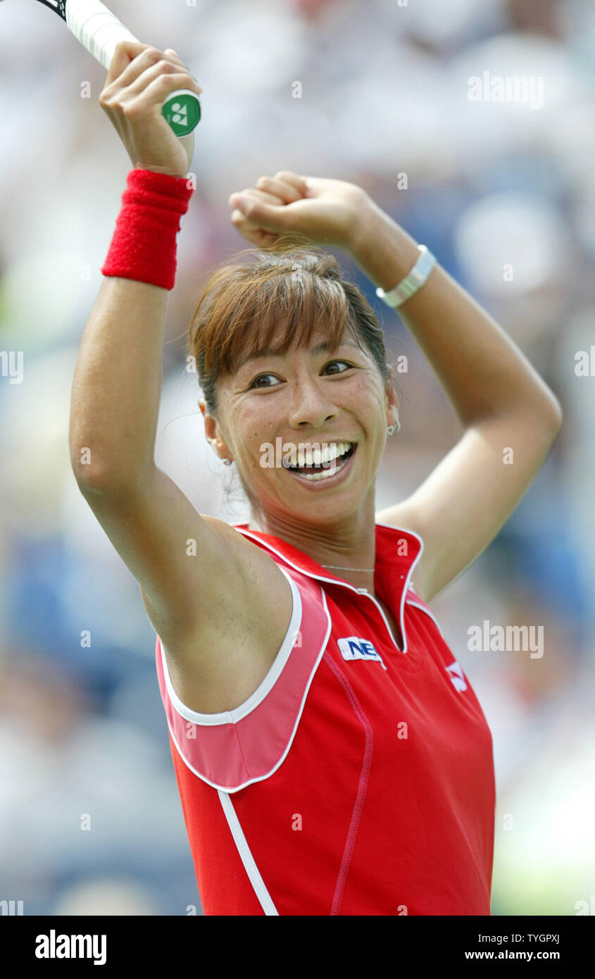 Shinobu Asagoe (JPN) raises her hands up after defeating Eleni Daniilidou (GRE) in 3 sets during day 8 action at the US Open in Flushing, New York on September 6, 2004.    (UPI Photo/John Angelillo) Stock Photo
