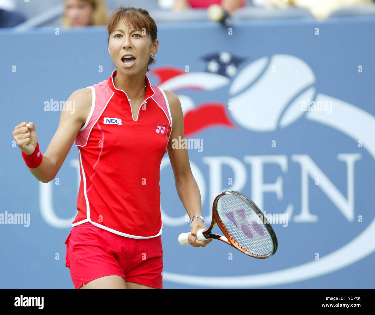 Shinobu Asagoe (JPN) pumps her fist while on route to defeating Eleni Daniilidou (GRE) in 3 sets during day 8 action at the US Open in Flushing, New York on September 6, 2004.    (UPI Photo/John Angelillo) Stock Photo