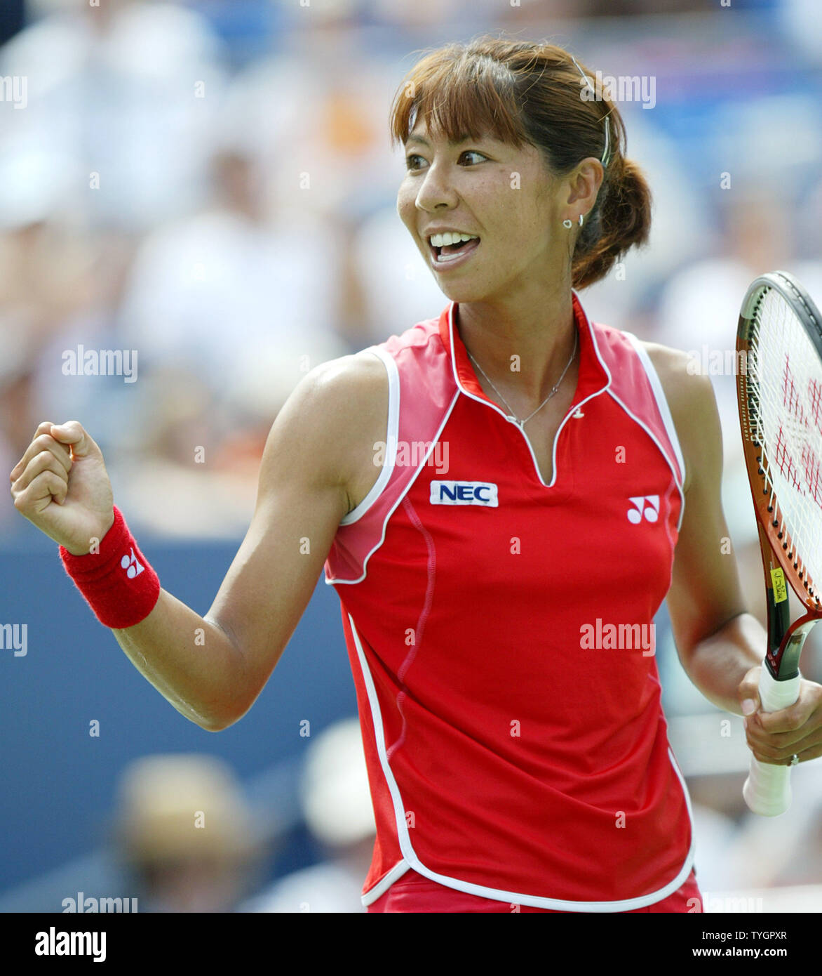 Shinobu Asagoe (JPN) pumps her fist while on route to defeating Eleni Daniilidou (GRE) in 3 sets during day 8 action at the US Open in Flushing, New York on September 6, 2004.    (UPI Photo/John Angelillo) Stock Photo