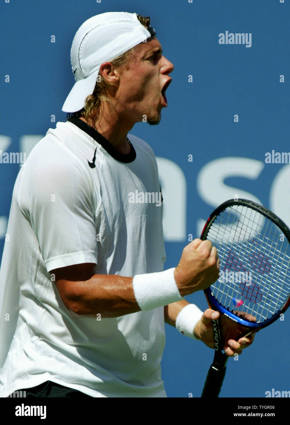 Lleyton Hewitt of Australia racts after winning a set against Karol Beck of  Slovakia during the 2004 US Open held at the National Tennis Center  September 7, 2004 at Flushing Meadows in