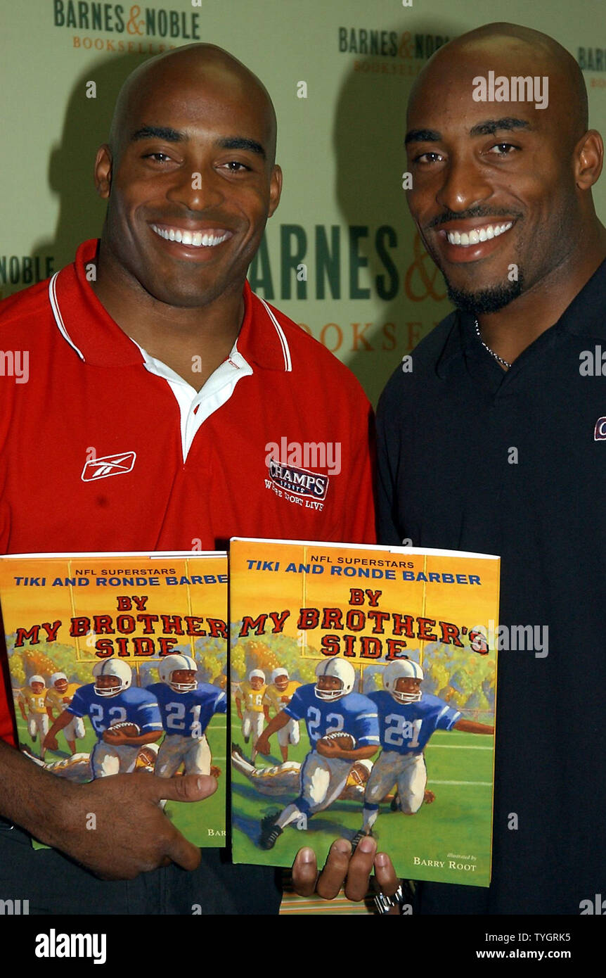 NFL football players Tiki Barber/N.Y. Giants (left) and Ronde Barber pose at the Sept. 14, 2004