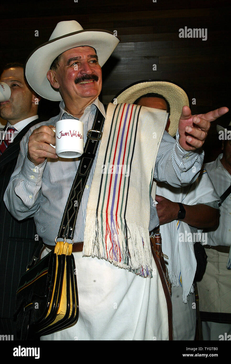 Juan Valdez, the icon of Colombian coffee, poses for pictures at the opening of the Juan Valdez Cafe in New York in New York on September 28, 2004.  (UPI Photo/Laura Cavanaugh) Stock Photo