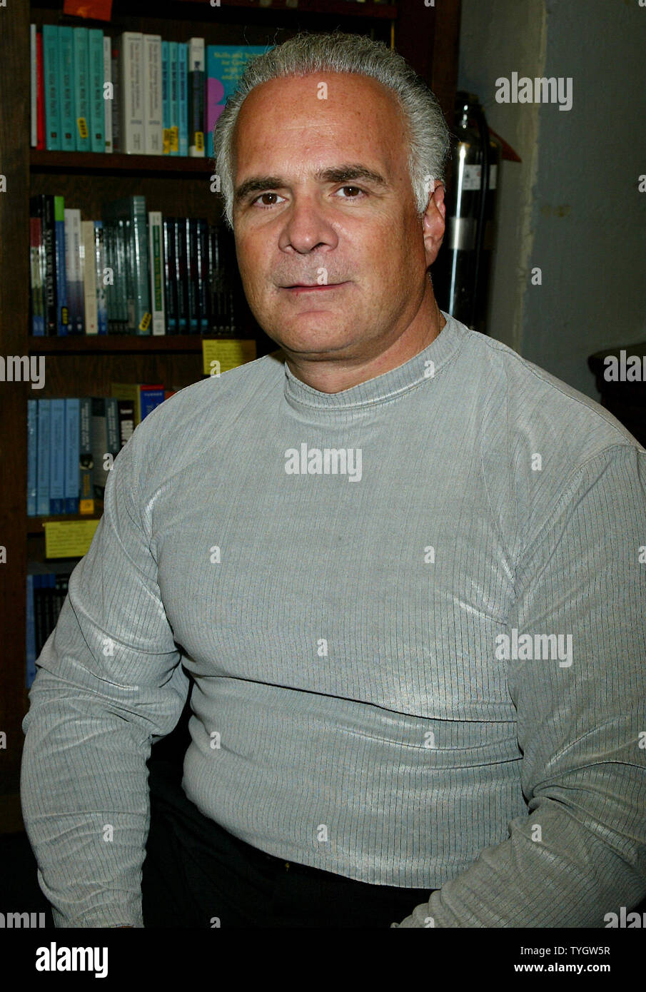 Amy Fisher's husband poses for pictures as his wife signs copies of her new book "If I Knew Then" at Barnes & Noble in New York on October 25, 2004.  (UPI Photo/Laura Cavanaugh) Stock Photo