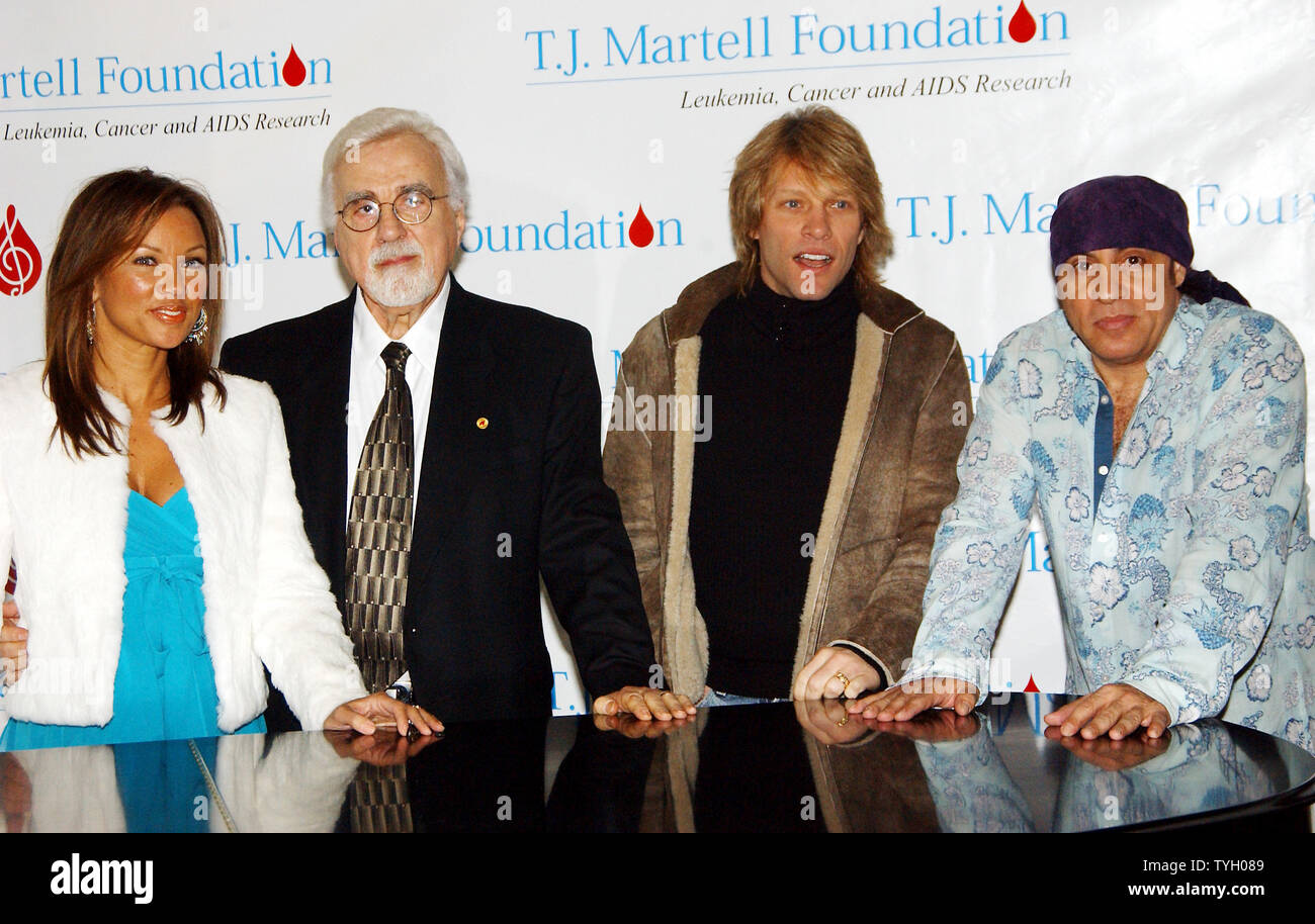 Tony Martell, Chairman and Founder of the T.J.Martell Foundation which funds innovative medical research into the treatment and cure of leukemia, cancer and AIDS, poses with actress/singer Vanessa Williams , Jon Bon Jovi and Steven Van Zandt (left to right)  on 2/8/05 after annoncing plans for the organization 30th anniversary gala.  (UPI Photo/Ezio Petersen) Stock Photo