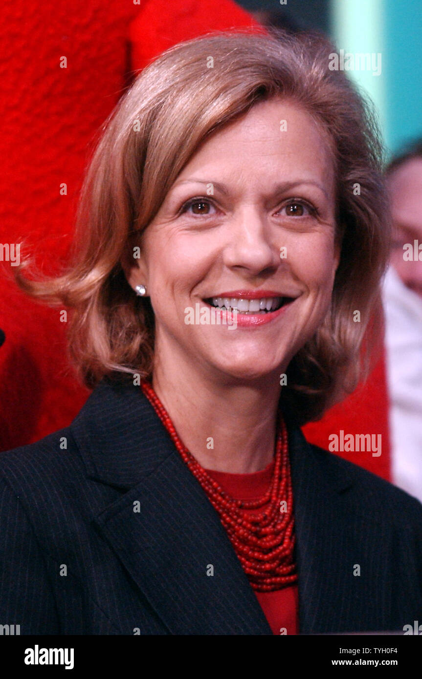 Deborah Forte, President of Scholastic Entertainment is joined by their  most famous book characther Clifford The Big Red Dog at the 2/14/05  ceremonial NASDAQ opening bell ring for trading in New York. (
