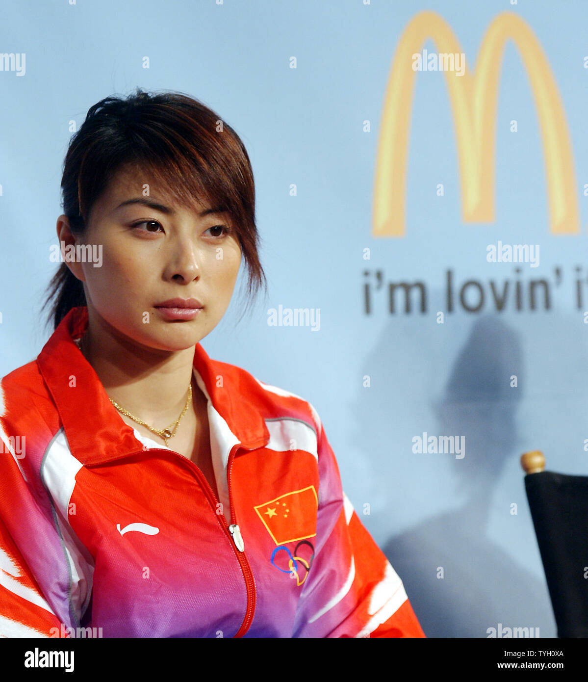 Guo Jingjing, who is on China Olympian diving team, takes part in the McDonald's New York promotional launch on March 8, 2005 of a multi faceted education campaign themed: 'it's what i eat and what i do...i'm lovin' it' to help consumers understand the important interplay between eating right and staying active.  (UPI Photo/Ezio Petersen) Stock Photo