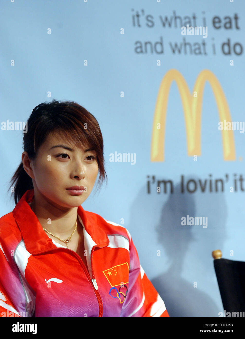 Guo Jingjing, who is on China Olympian diving team, takes part in the McDonald's New York promotional launch on March 8, 2005 of a multi faceted education campaign themed: 'it's what i eat and what i do...i'm lovin' it' to help consumers understand the important interplay between eating right and staying active.  (UPI Photo/Ezio Petersen) Stock Photo