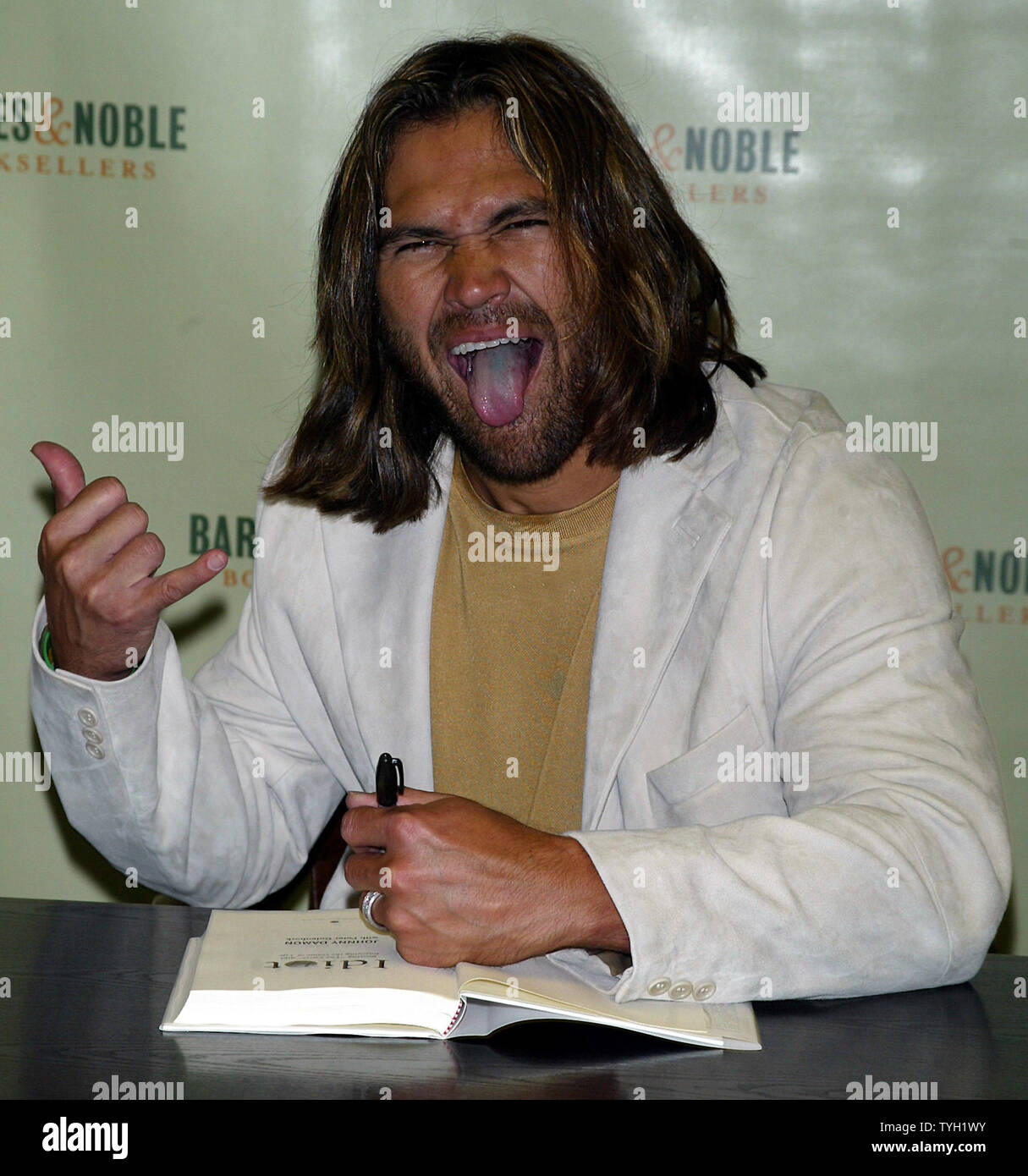 Johnny Damon signs copies of his new book Idiot: Beating The Curse and  Enjoying the Game of Life at Barnes & Noble in New York on April 4, 2005.  (UPI Photo/Laura Cavanaugh