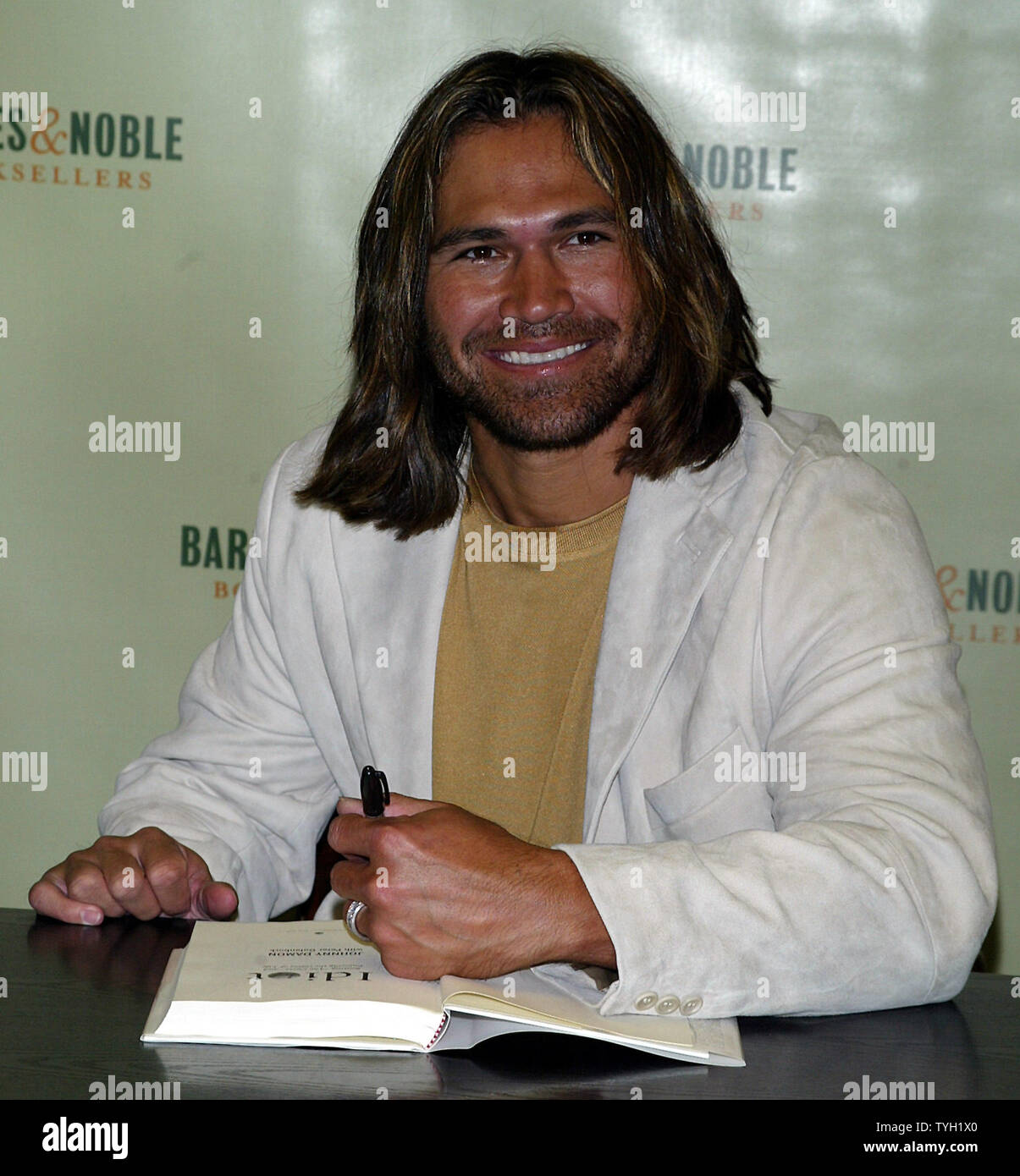 Johnny Damon signs copies of his new book Idiot: Beating The Curse and  Enjoying the Game of Life at Barnes & Noble in New York on April 4, 2005.  (UPI Photo/Laura Cavanaugh