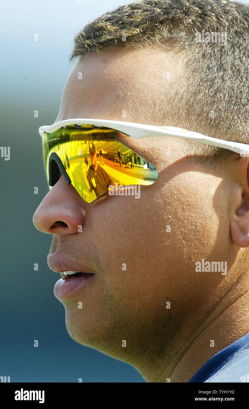 The reflection of Tino Martinez can bee seen the the sunglasses worn by Alex Rodrigues as the New York Yankees warms up during batting practice before their game against the Boston Red Sox at Yankee Stadium April 6, 2005 in New York City. (UPI Photo/Monika Graff) Stock Photo