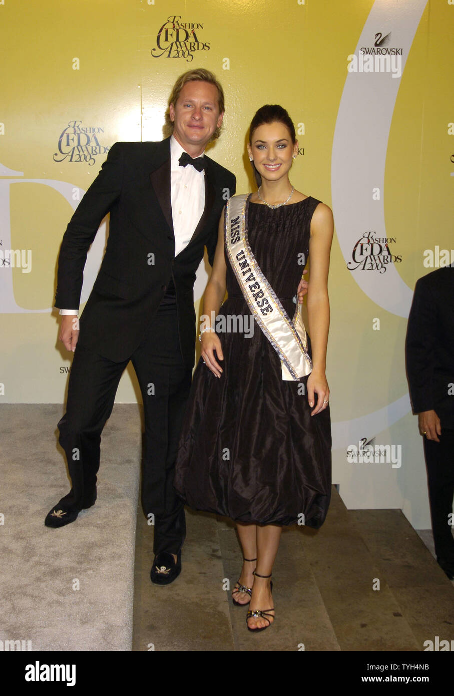 Carson Kressley and Miss Universe Natalie Glebova arrive at The 2005 CFDA Awards at The New York Public Library in New York on June 6, 2005 .    (UPI Photo/Robin Platzer) Stock Photo