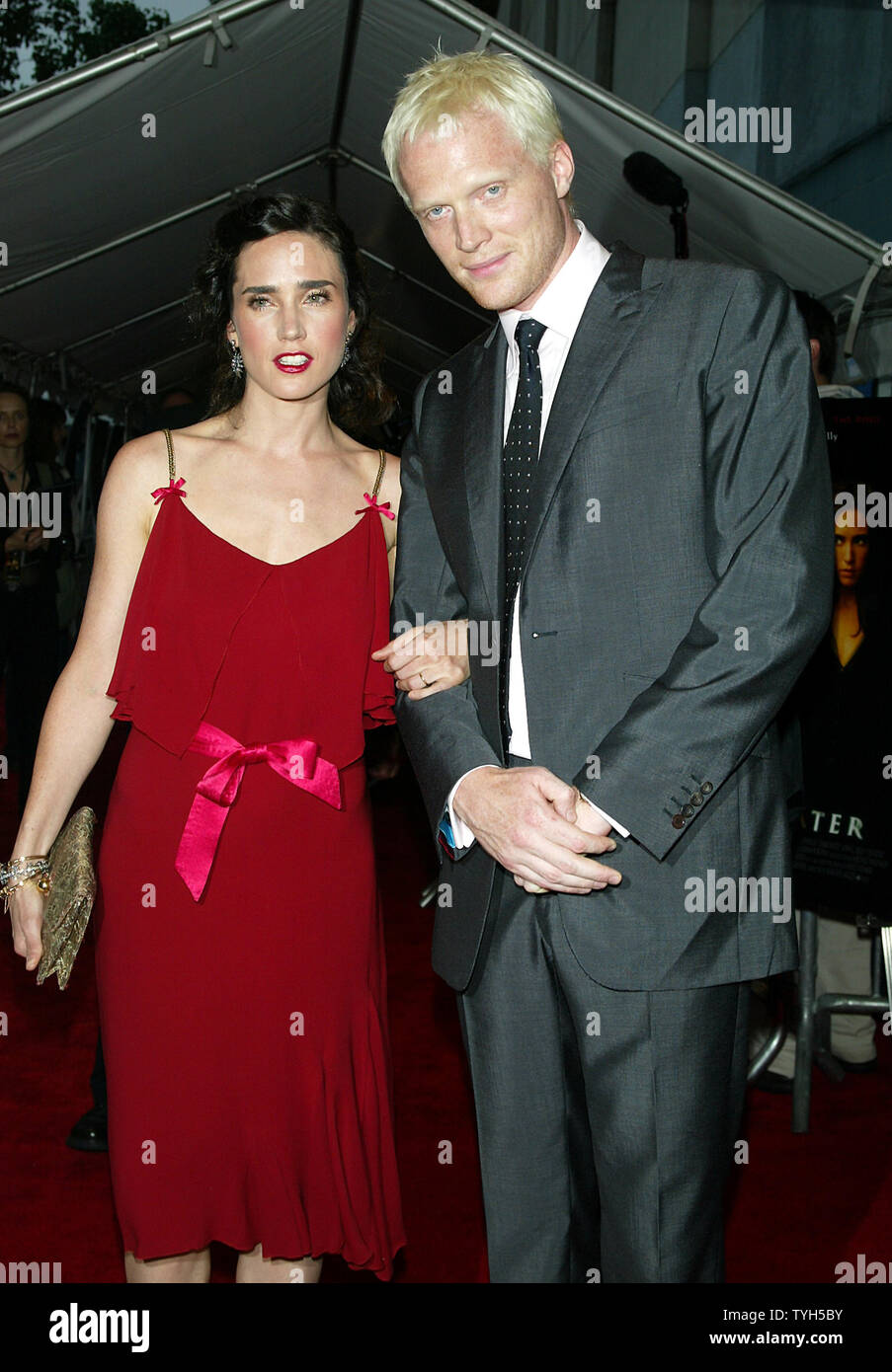 Jennifer Connelly holds hands with husband Paul Bettany