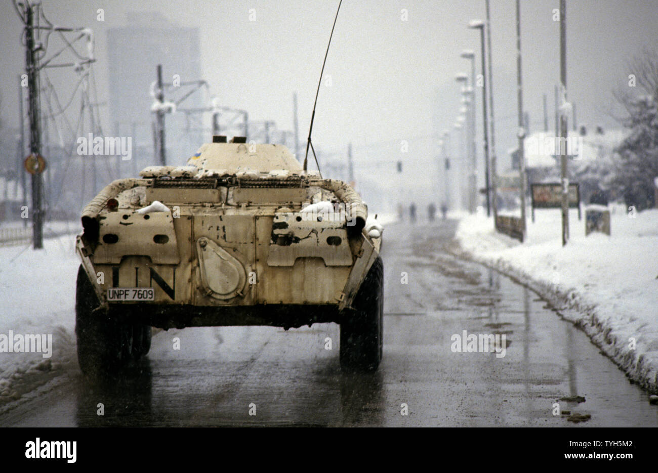 26th March 1993 During the Siege of Sarajevo: a United Nations Ukrainian BTR-80 APC drives east along Bulevar Meše Selimovića. Stock Photo