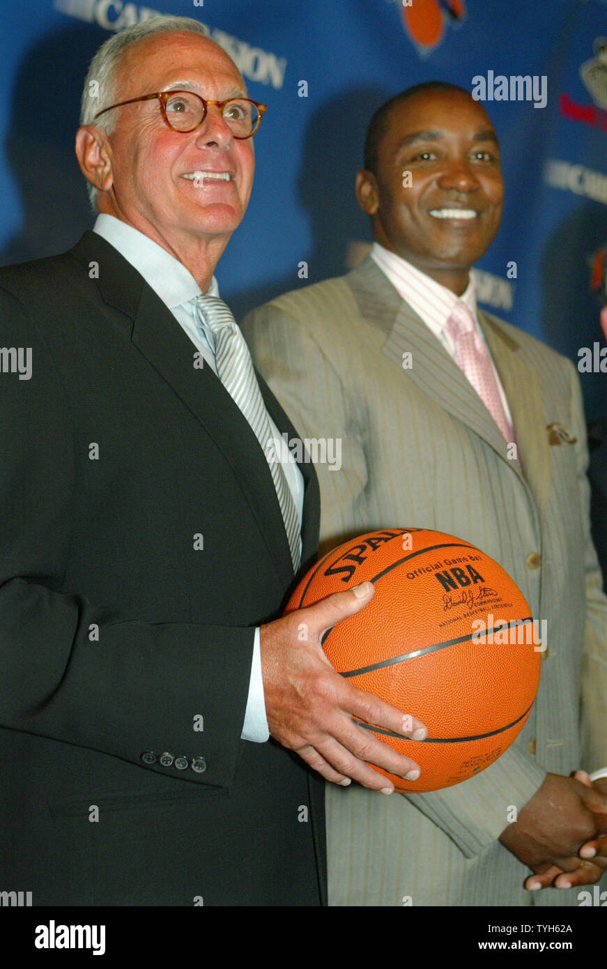 Basketball Hall of Famer Larry Brown, left, stands by New York Knick's president Isiah Thomas after the Knicks accounce that Brown is their new head coach during a press conference at Madison Square Garden on July 28, 2005 in New York City. Brown, former coach for the Detroit Pistons, will be the highest paid basketball coach ever, receiving over $10 million a year.  (UPI Photo/Monika Graff) Stock Photo