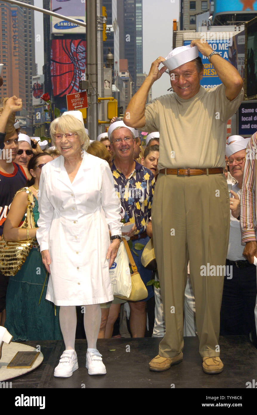 Edith Shain and Carl Muscarello are shown at the 60th Anniversary of the end of World War II in Times Square on August 14, 2005.  They were recreating the famous pose from the Alfred Eisenstadt photograph celebrating the Allied victory in the war. They claim to be the original couple in the photograph.   (UPI Photo/Robin Platzer) Stock Photo