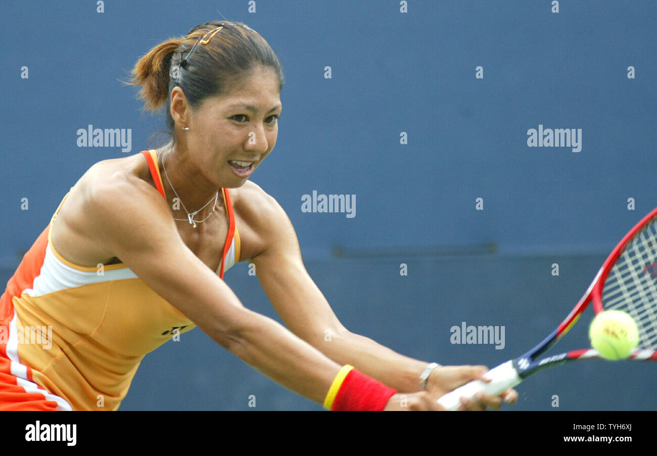 Shinobu Asagoe of Japan returns the ball to Stephanie Cohen-Aloro of France and goes on to defeat her 6-1,6-4 at the US Open held at the National Tennis Center on August 30, 2005.      (UPI Photo/Monika Graff) Stock Photo