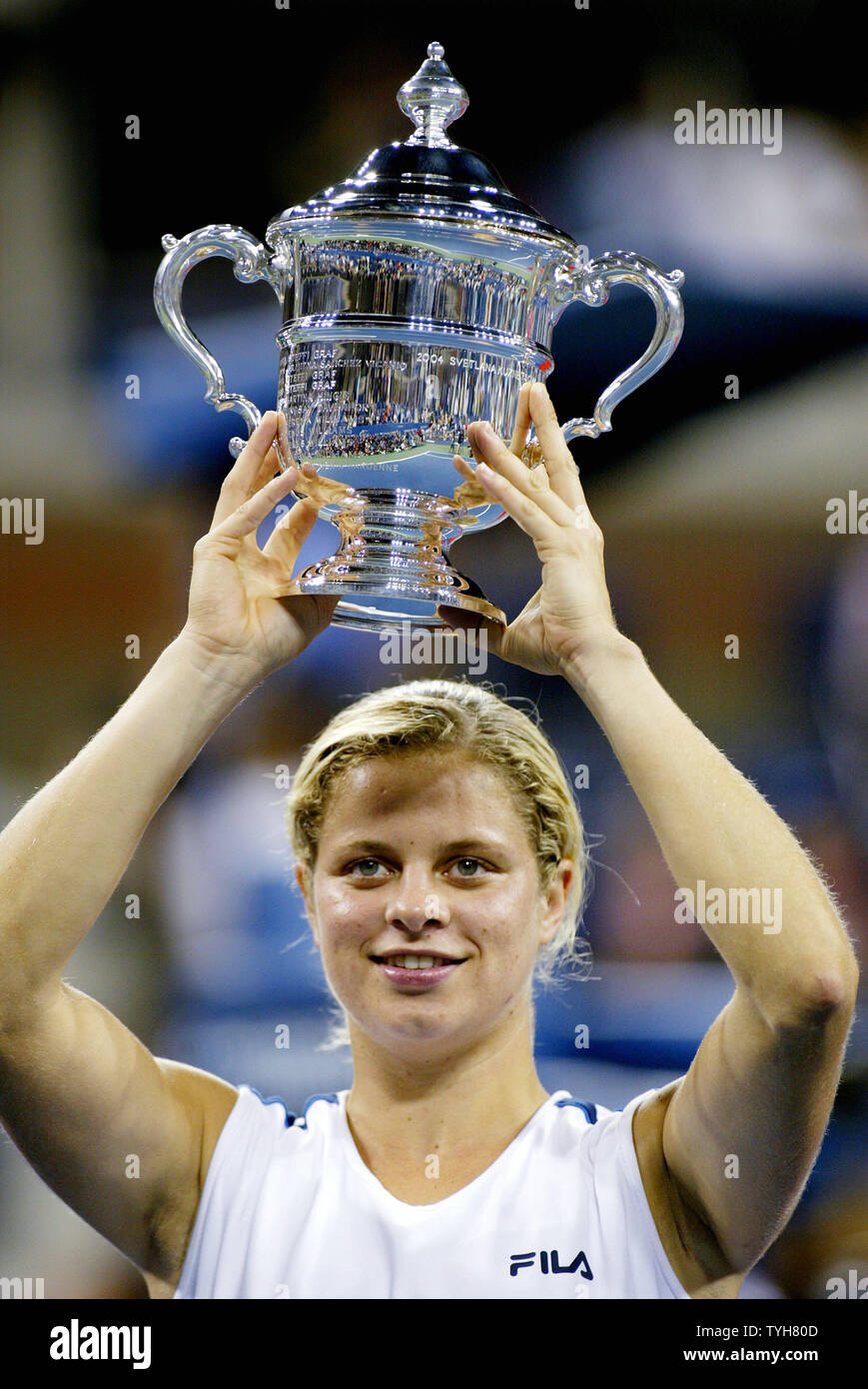 Kim Clijsters of Belgium holds her US Open championship trophy after defeating Mary Pierce of France 6-3, 6-1 the US Open Tennis tournament held at the National Tennis Center on September 10, 2005 in New York City.  (UPI Photo/Monika Graff) Stock Photo