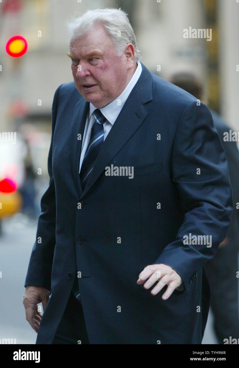 John Madden, former football coach and announcer, arrives to the funeral for  Wellington Mara, co-owner of the Giant's football team, at St. Patrick's Cathedral  at the conclusion of his funeral on October 28, 2005 in New York City. Mara, who succumbed to cancer at the age of 89, began as a ball boy when his father owned the New York team and later went on to become its owner. (UPI Photo/Monika Graff) Stock Photo