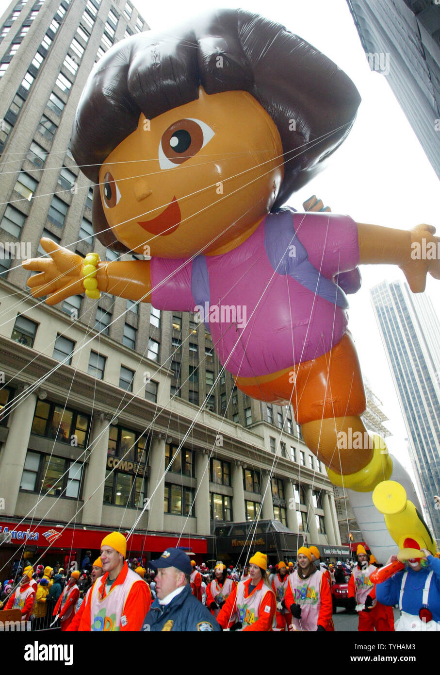 The Dora the Explorer giant helium balloon makes it's debut as it is guided down Broadway during the 79th Macy's Thanksgivings Day parade on November 24, 2005 in New York City. Dora, (UPI Photo/Monika Graff) Stock Photo