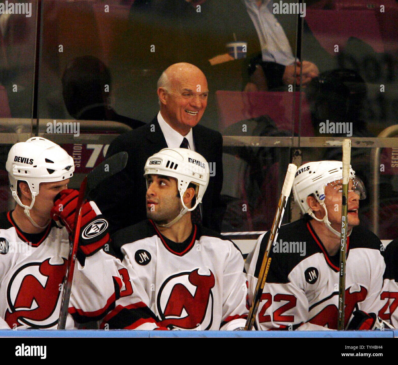 New Jersey Devils interim head coach Lou Lamoriello reacts in the second  period at Madison Square Garden in New York City on December 20, 2005. The New  Jersey Devils defeated the New