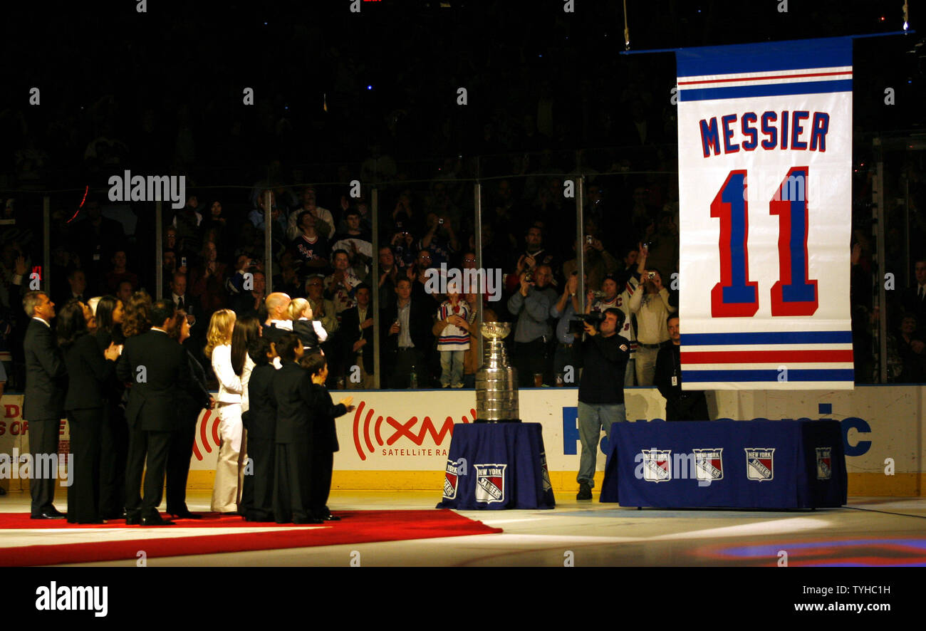 New York Rangers longtime captain Mark Messier and family watch as they ...