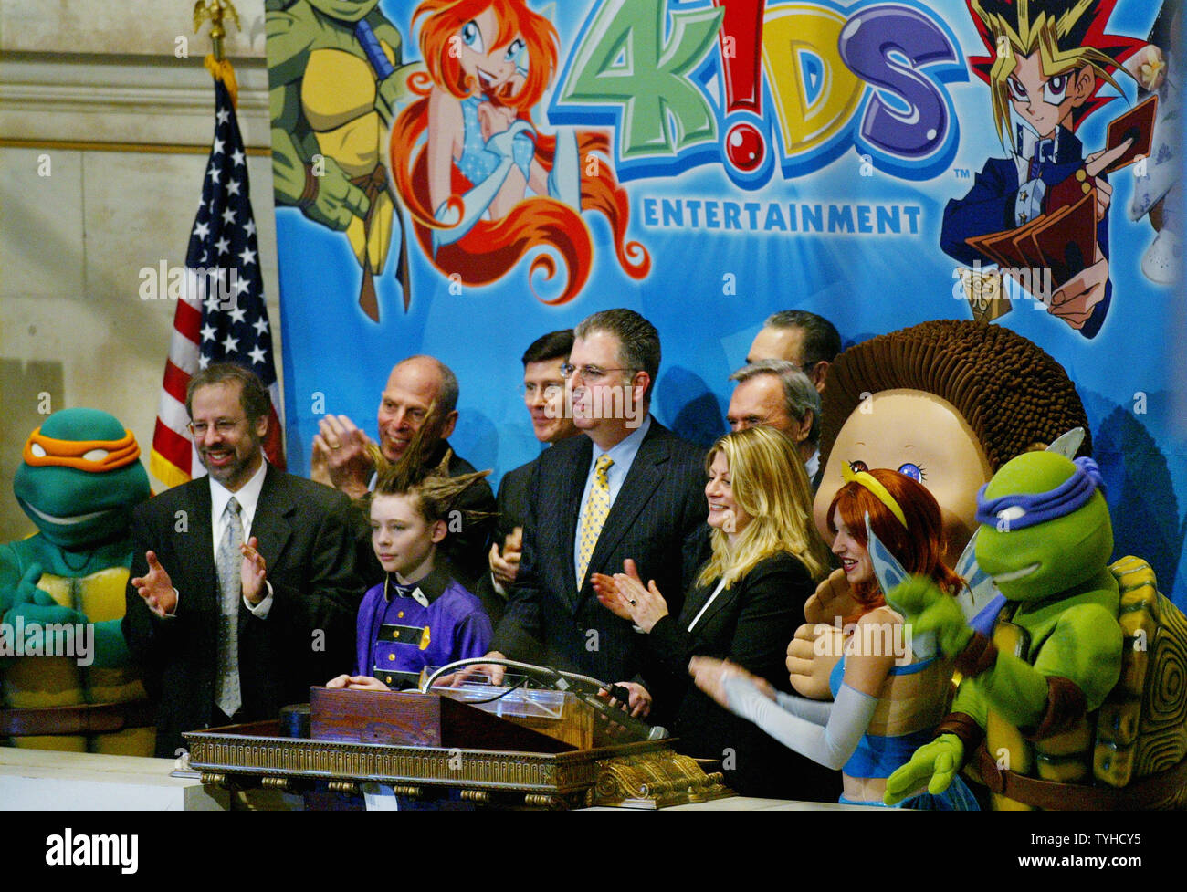 Alfred Kahn, center, chairman and CEO of 4 Kids Entertainment, is ...