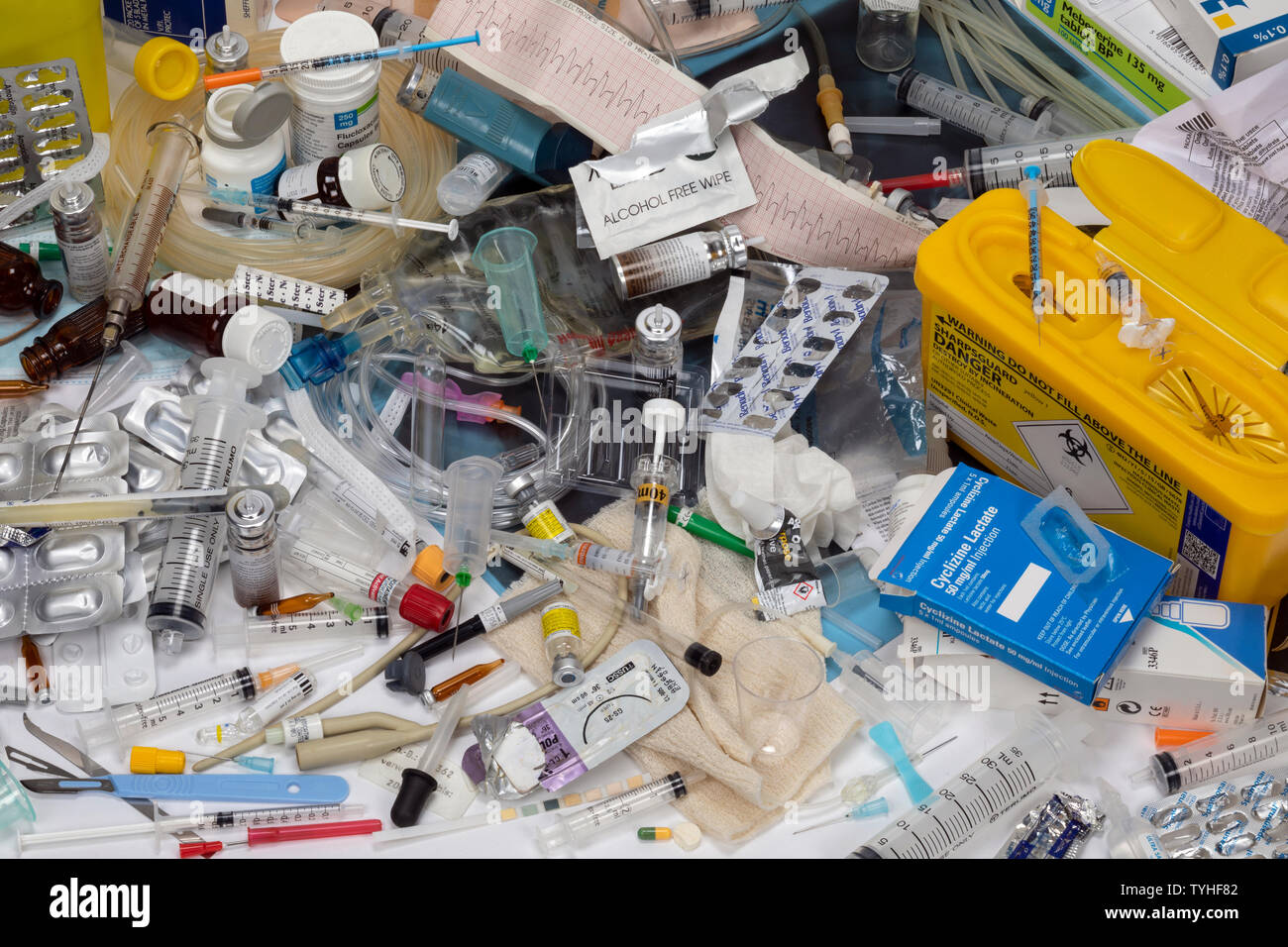Medical Waste - Disposal of some of the many use once plastic, paper, cardboard, glass and metal items used in modern medicine. Stock Photo