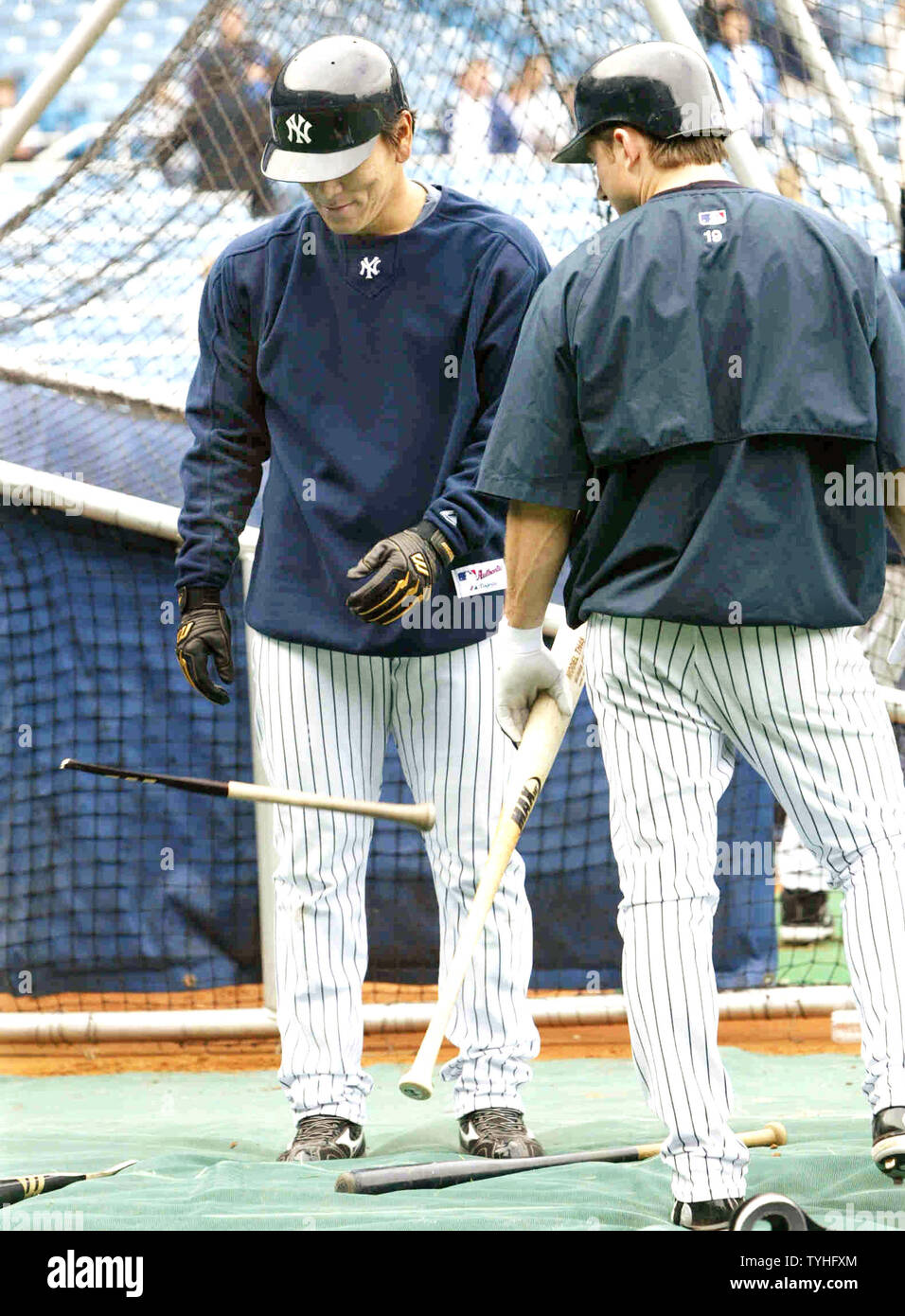 New York Yankees' Hideki Matsui watches his his broken bat single