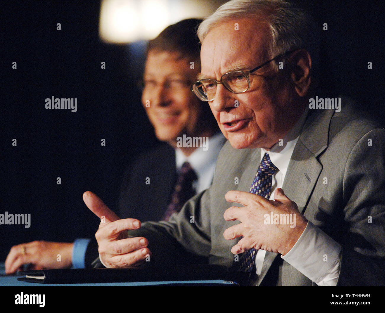 Microsoft Chairman Bill Gates (left)  listens to Warren Buffett, CEO of Berkshire Hathaway Inc. explain to the New York media on June 26, 2006 the reasons for donating $37 billion dollars of his fortune over the next few years to the Bill and Melinda Gates Foundation.   (UPI Photo/Ezio Petersen) Stock Photo