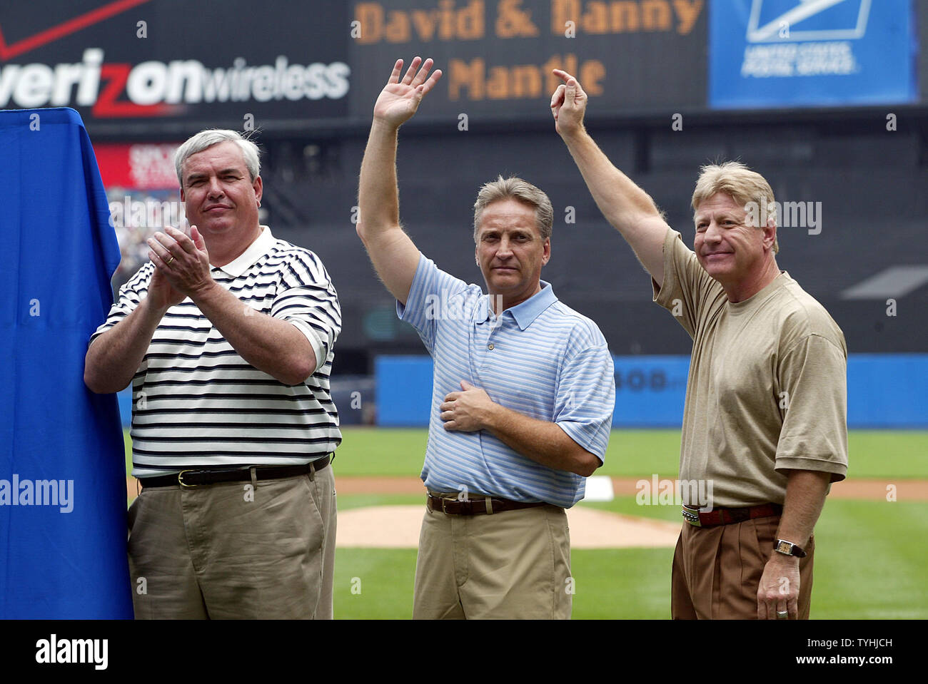 Postmaster General and CEO of the U.S. Postal Service, John E. Potter (L)  with Mickey Mantle's sons Daniel Mantle (C) and David Mantle during the  Home Plate Ceremony of the Baseball Sluggers