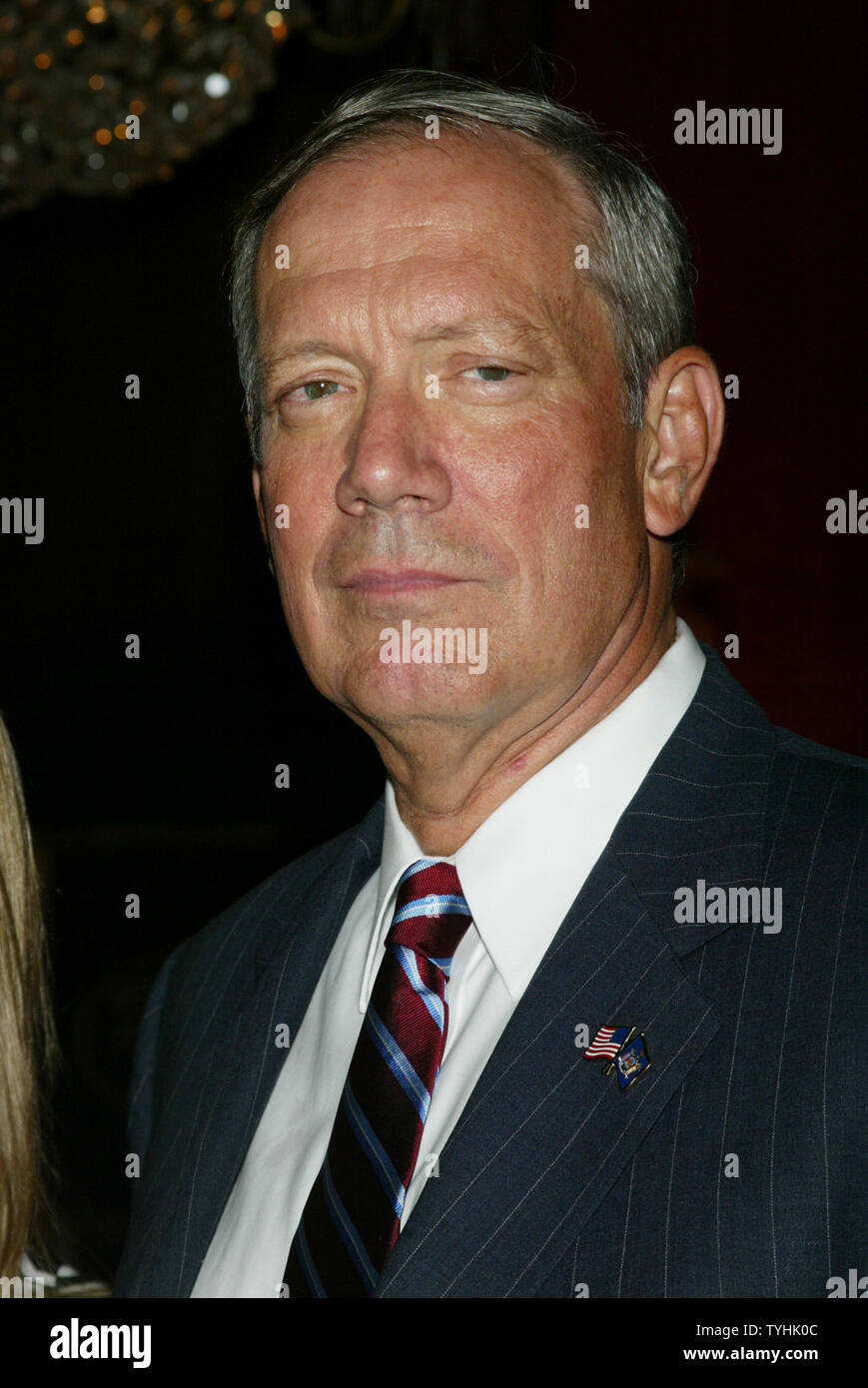 New York Governor George Pataki arrives for the premiere of 