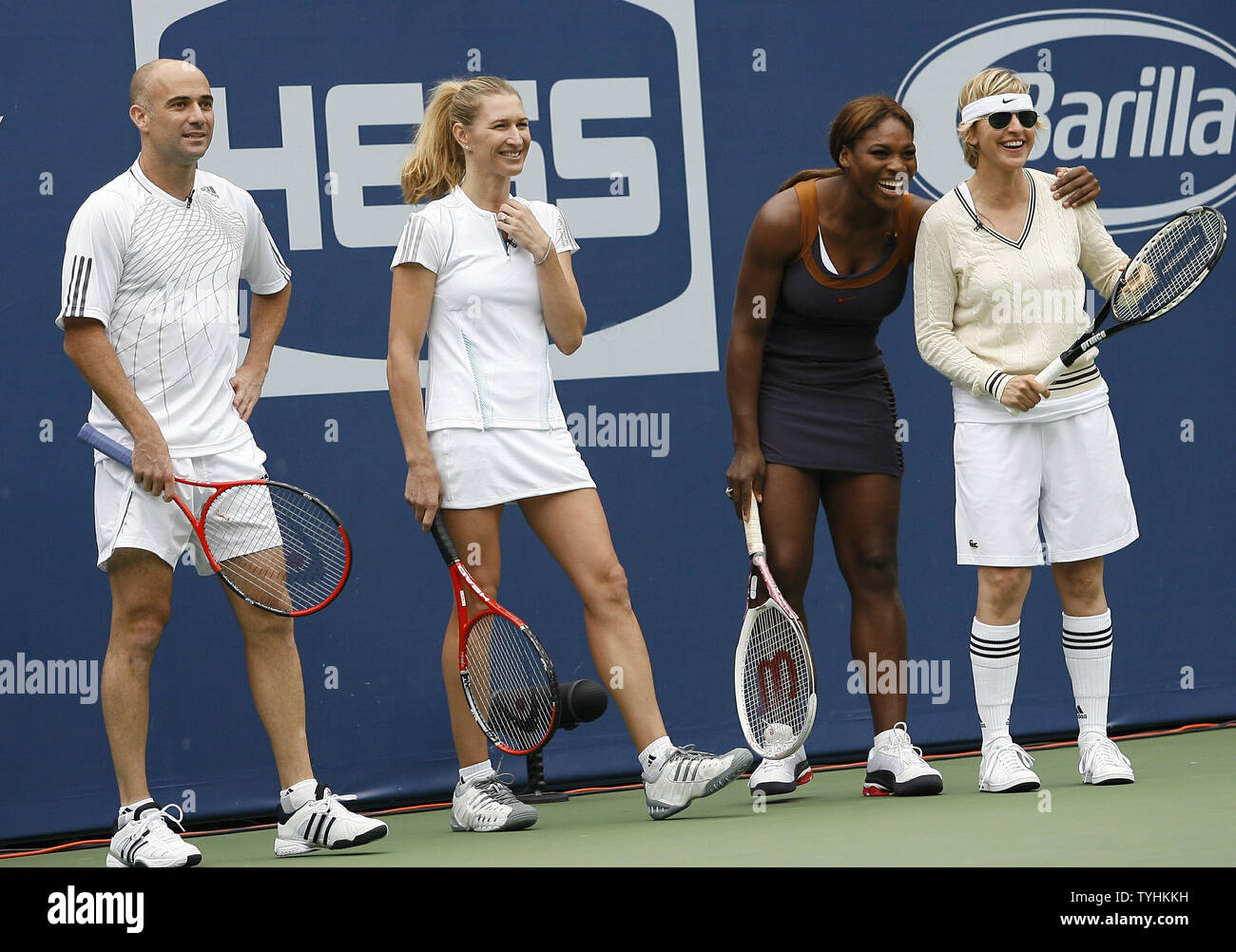 Andre Agassi, Steffi Graf, Serena Williams, and Ellen DeGeneres have a  laugh while on the court during Arthur Ashe Kids Day in Queens, NY on  August 26, 2006. (UPI Photo/John Angelillo Stock